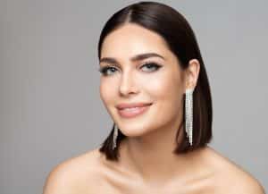 Woman has smooth forehead and attractive eyebrows after cosmetic treatment.